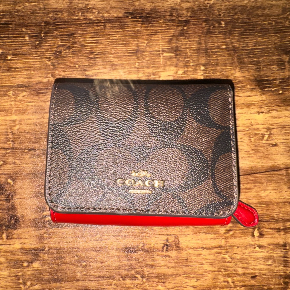 Coach trifold wallet in near mint condition